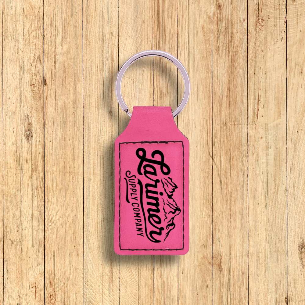 Larimer Supply Company premium leatherette keychain in primrose