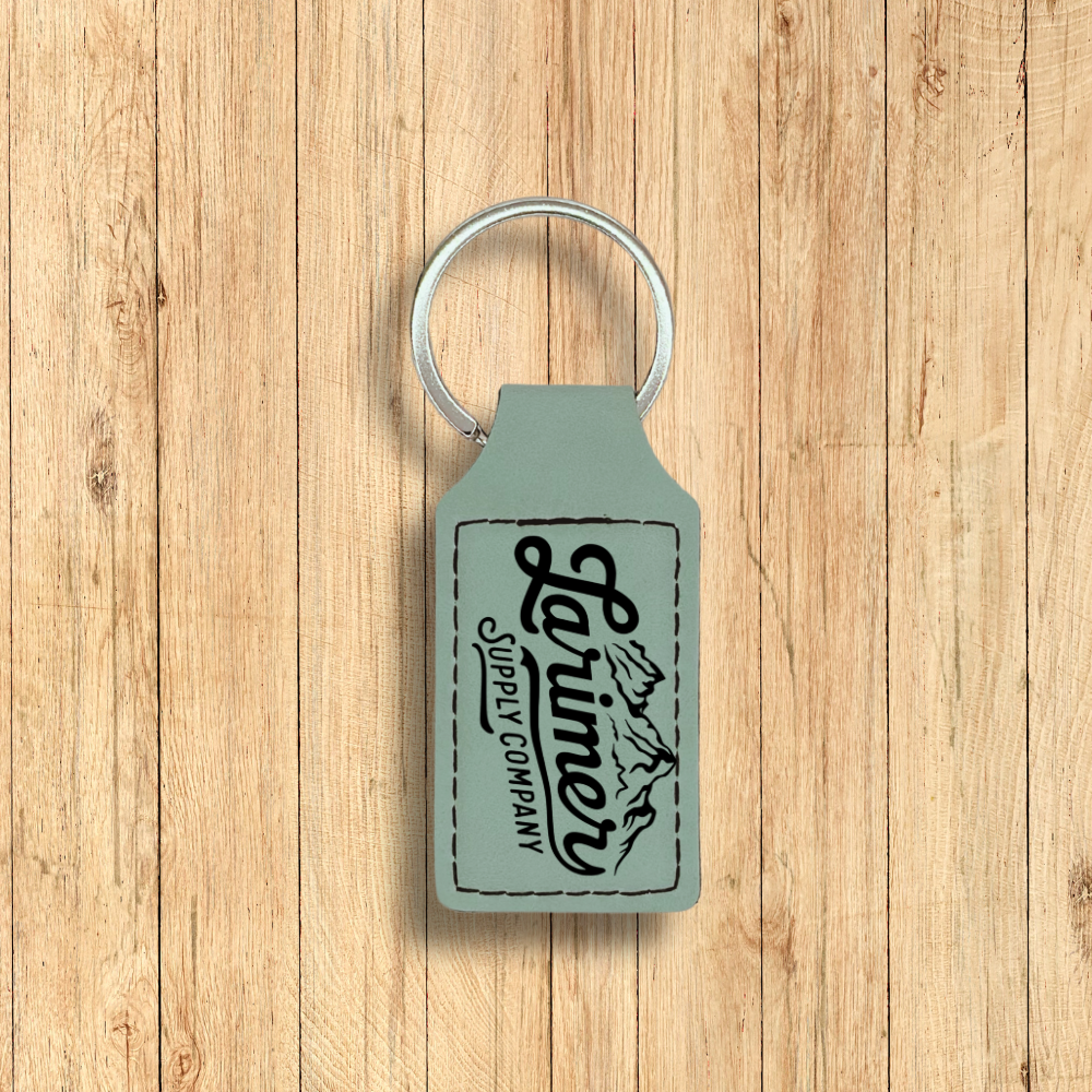 Larimer Supply Company premium leatherette keychain in seafoam green