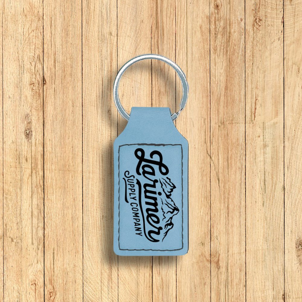 Larimer Supply Company premium leatherette keychain in sky blue